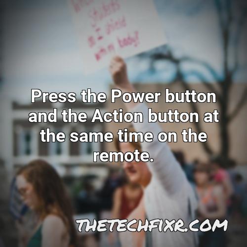 press the power button and the action button at the same time on the remote