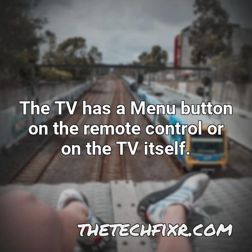 the tv has a menu button on the remote control or on the tv itself