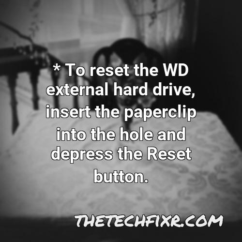 to reset the wd external hard drive insert the paperclip into the hole and depress the reset button